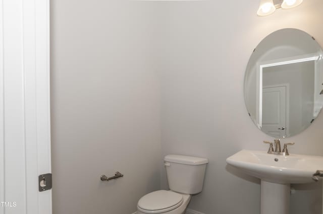 bathroom featuring toilet