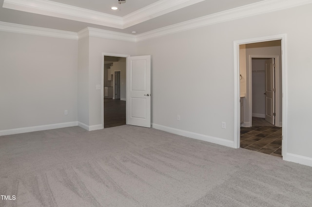 carpeted empty room featuring ornamental molding