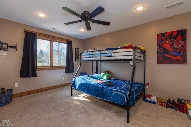 carpeted bedroom featuring ceiling fan