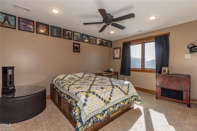 carpeted bedroom with ceiling fan