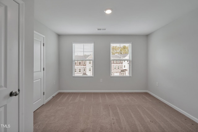 view of carpeted spare room