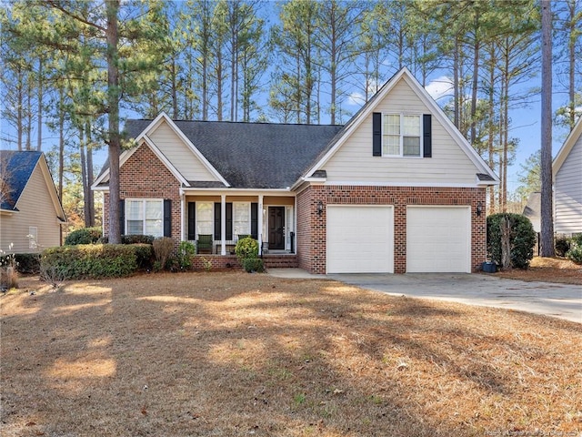 view of front of property featuring a porch and a garage