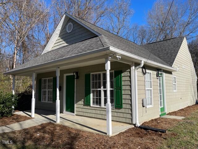 view of home's exterior with a porch