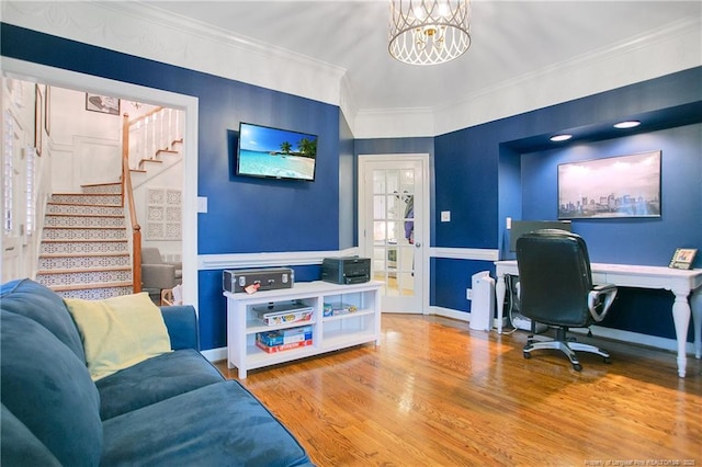 home office with a chandelier, wood-type flooring, and crown molding