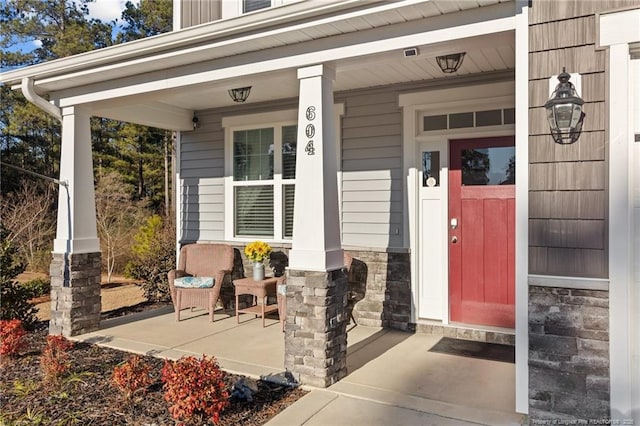 entrance to property with a porch