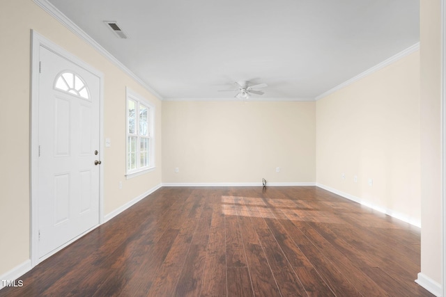 foyer entrance with ceiling fan, crown molding, and dark hardwood / wood-style floors