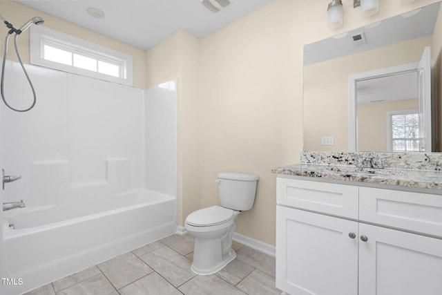 full bathroom with shower / tub combination, vanity, toilet, and a wealth of natural light