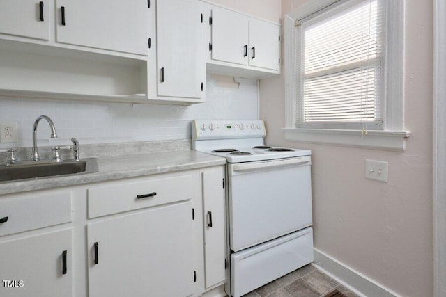 kitchen featuring tasteful backsplash, sink, white electric stove, tile patterned flooring, and white cabinetry