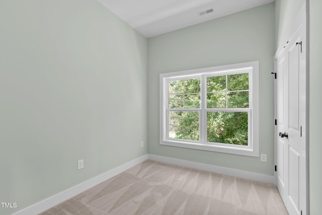 view of carpeted spare room