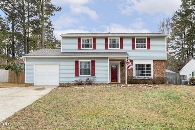 view of front of home with a garage, a front yard, and central air condition unit