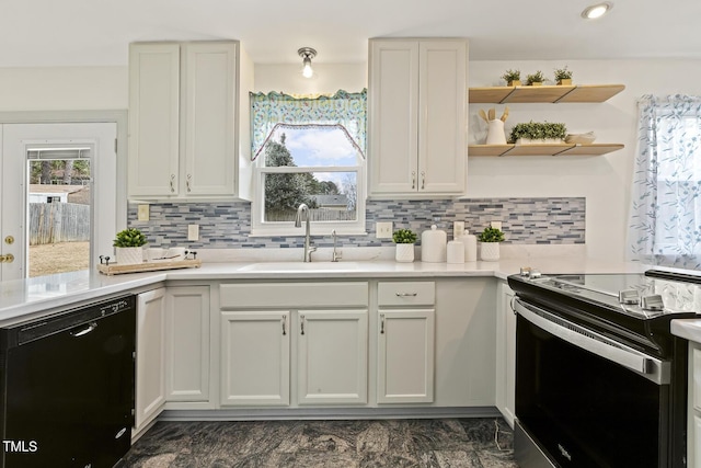 kitchen with sink, white cabinetry, black dishwasher, and range with electric stovetop