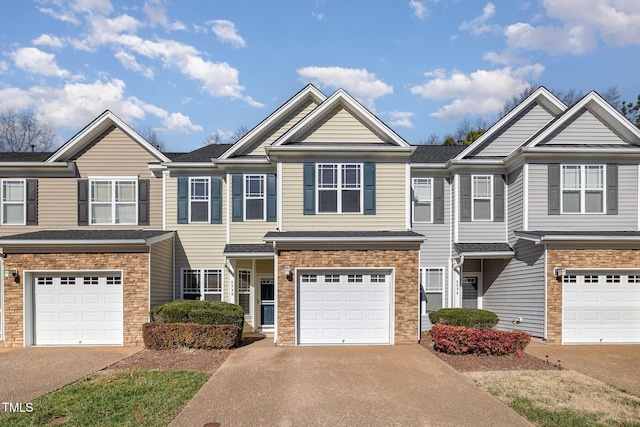 multi unit property featuring a garage