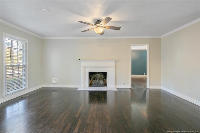 unfurnished living room featuring ceiling fan, dark hardwood / wood-style flooring, and ornamental molding