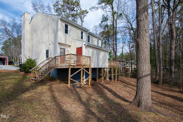 rear view of property with a deck