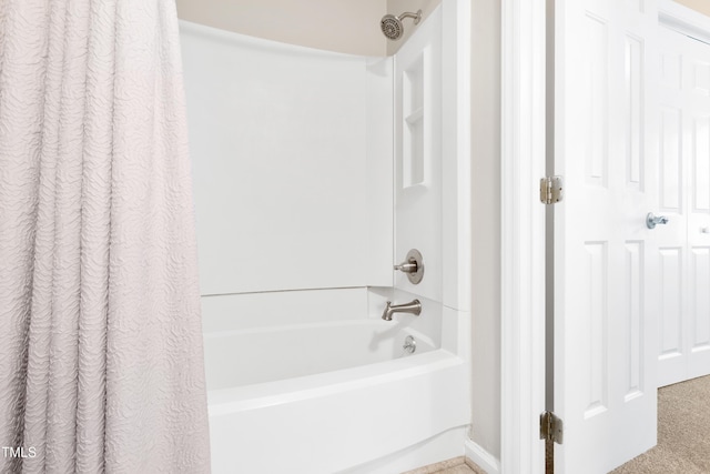 bathroom featuring shower / bath combo