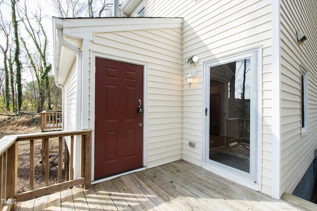 entrance to property with a deck