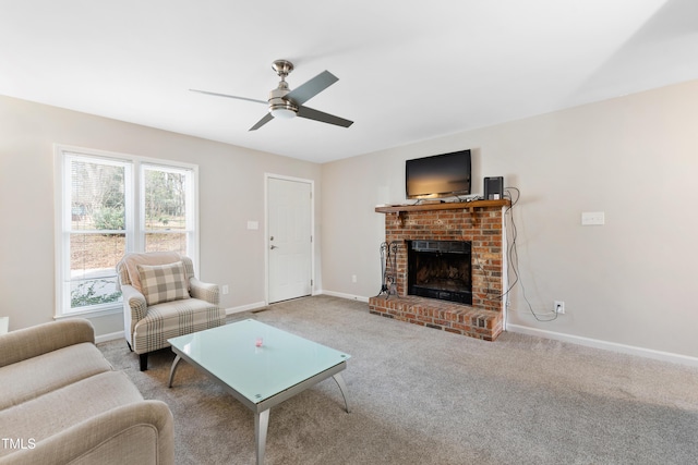 carpeted living room featuring ceiling fan and a fireplace