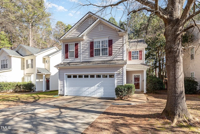 front of property with a garage