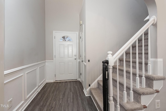 entrance foyer with dark hardwood / wood-style floors