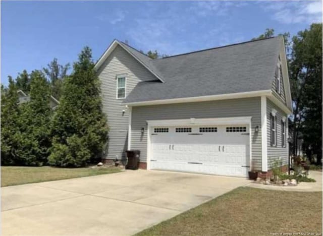 view of home's exterior with a garage