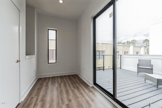 spare room featuring light wood-type flooring