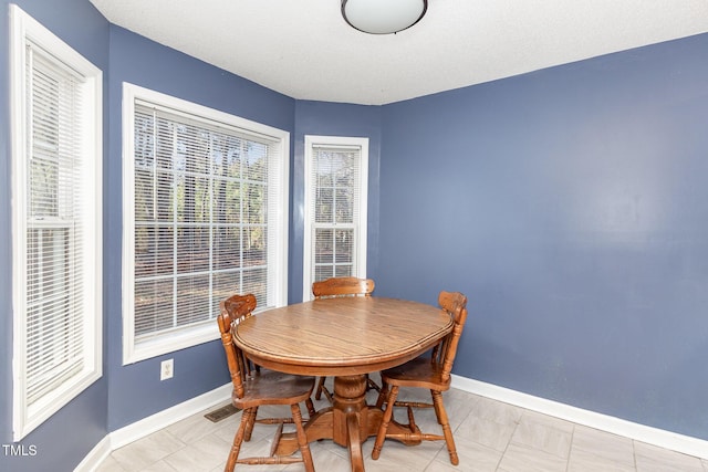 view of tiled dining space