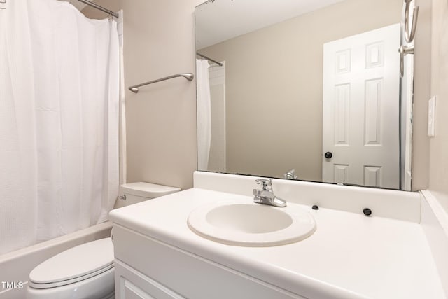 full bathroom with vanity, toilet, and shower / bath combo