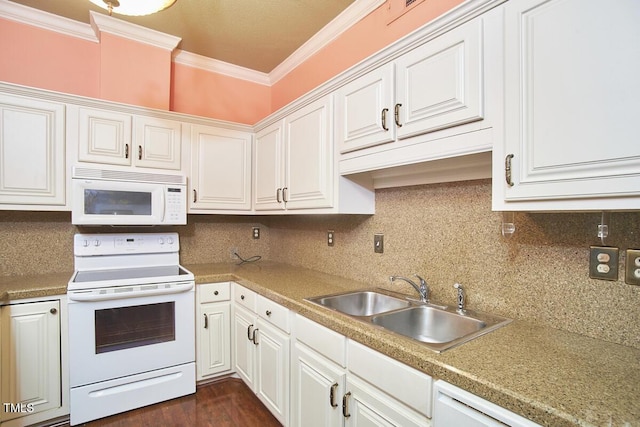 kitchen featuring white appliances and white cabinetry