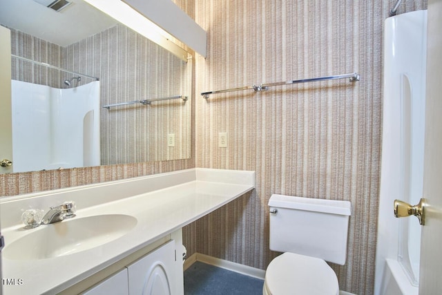 bathroom with vanity and toilet