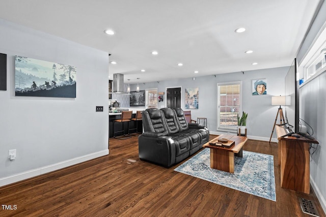 living room featuring dark hardwood / wood-style floors