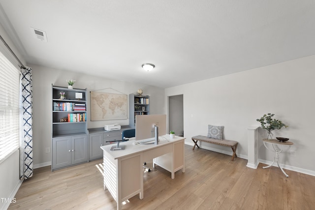 office space featuring light wood-type flooring