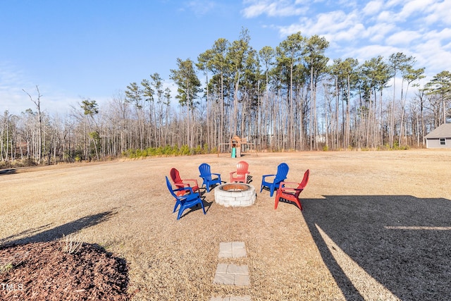 exterior space featuring a fire pit