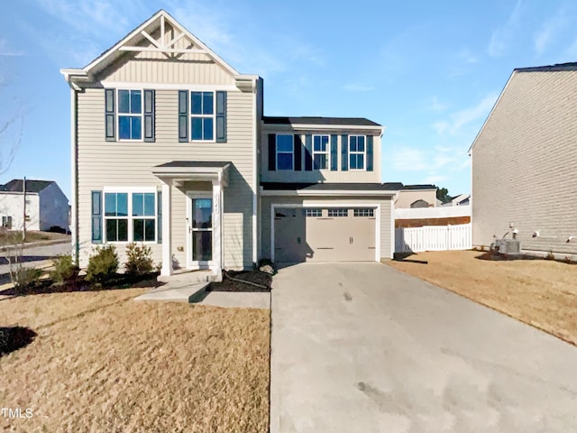 view of front facade featuring central AC, a front yard, and a garage