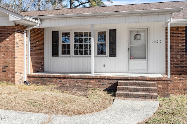 doorway to property with covered porch