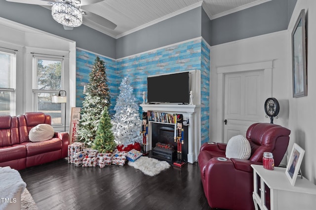 living room with ceiling fan, crown molding, and dark wood-type flooring