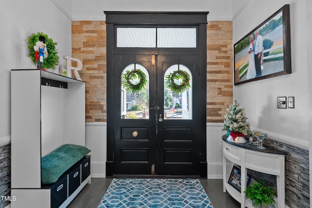 entrance foyer featuring french doors and dark hardwood / wood-style floors