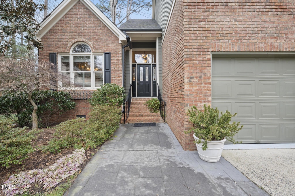 entrance to property featuring a garage