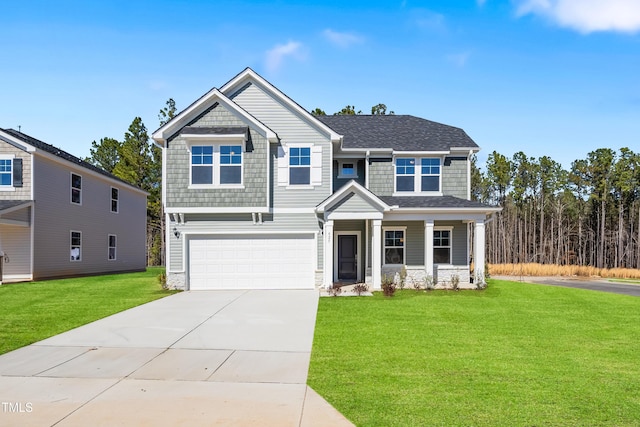 craftsman house featuring an attached garage, concrete driveway, a front yard, and a shingled roof