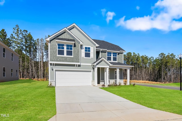 craftsman inspired home featuring a front yard, a porch, an attached garage, a shingled roof, and concrete driveway