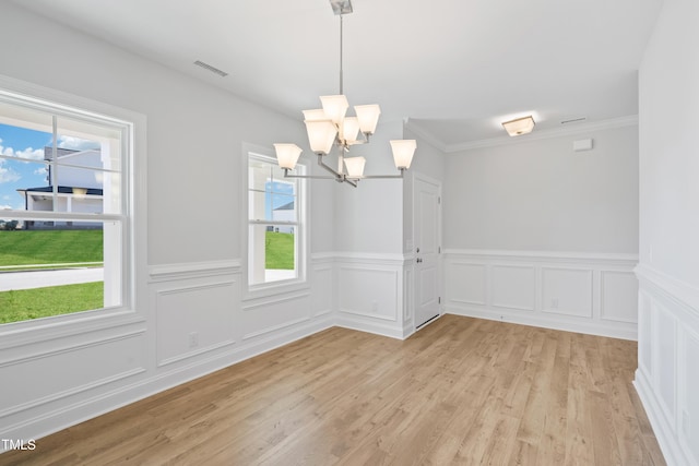 625 Spellbrook Rd, Zebulon, NC 27597 - unfurnished dining area featuring an inviting chandelier, light wood-style floors, a healthy amount of sunlight, and visible vents