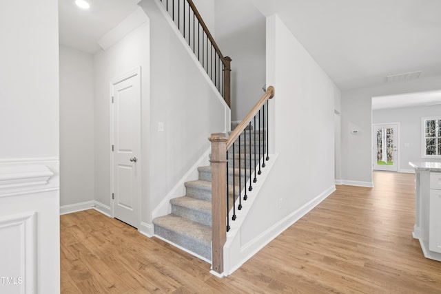 625 Spellbrook Rd, Zebulon, NC 27597 - stairs with visible vents, baseboards, and wood finished floors