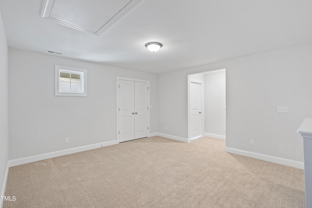 625 Spellbrook Rd, Zebulon, NC 27597 - unfurnished room with attic access, baseboards, visible vents, and light carpet