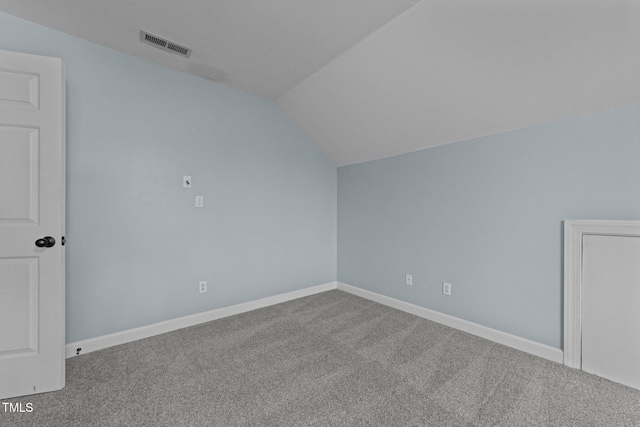 bonus room featuring carpet and lofted ceiling