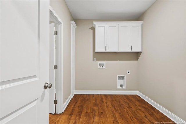 laundry room with hookup for a washing machine, dark wood-style floors, baseboards, cabinet space, and electric dryer hookup