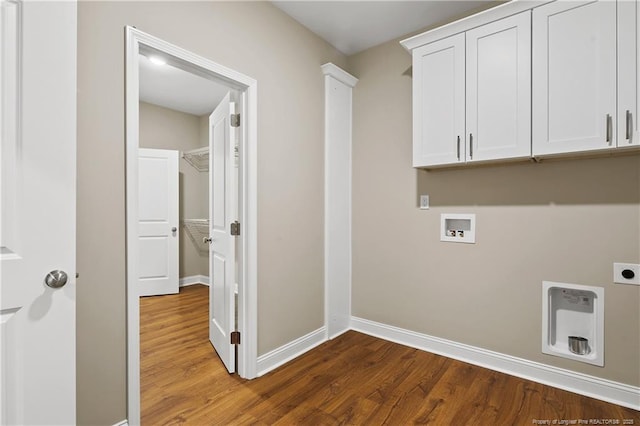 laundry area featuring washer hookup, cabinet space, dark wood-style flooring, and electric dryer hookup