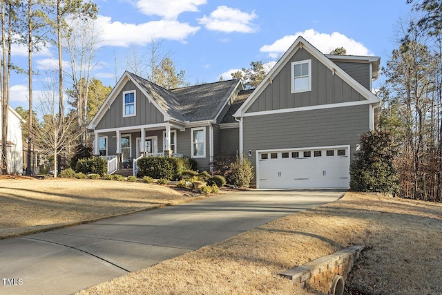 craftsman-style home with covered porch and a garage