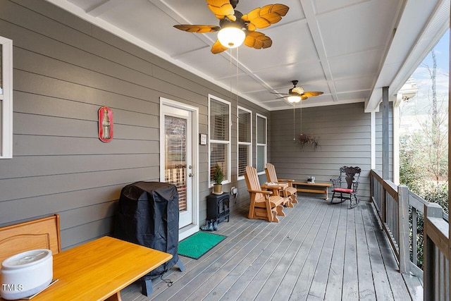 deck featuring ceiling fan and covered porch