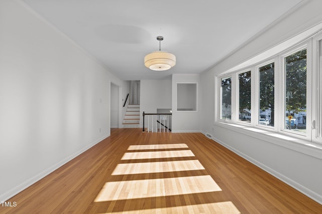 unfurnished room featuring light wood-type flooring