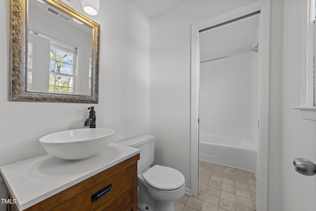 full bathroom with vanity, shower / bathtub combination, and toilet