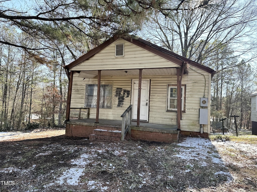 bungalow-style home featuring a porch